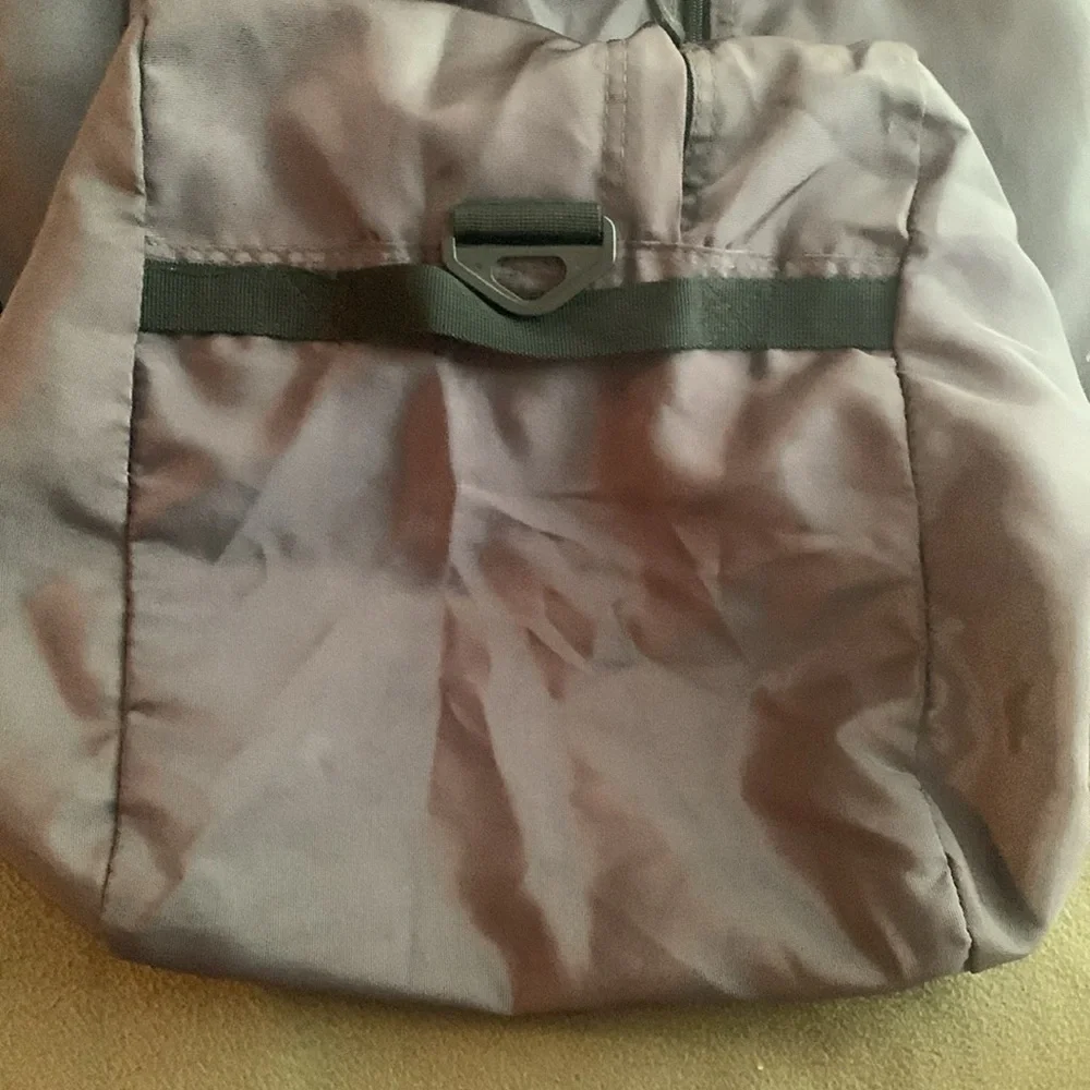 Dark gray and black nylon duffel bag. Approximately 27” x 15” x 11 1/2”